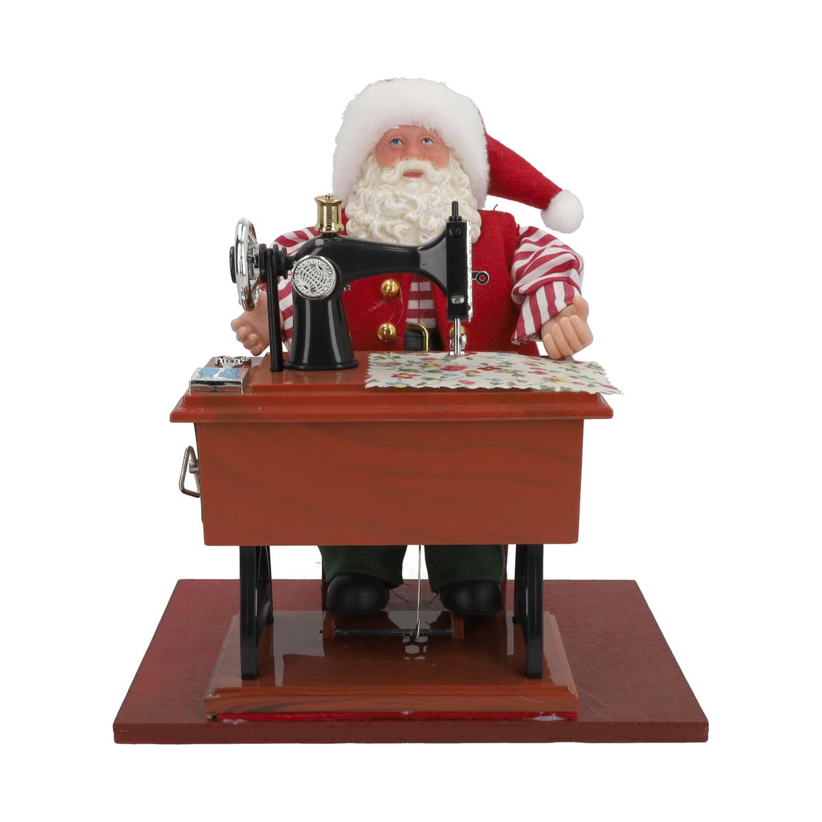 Kerstman met naaimachine 23 cm Kerstman met naaimachine 23 cm