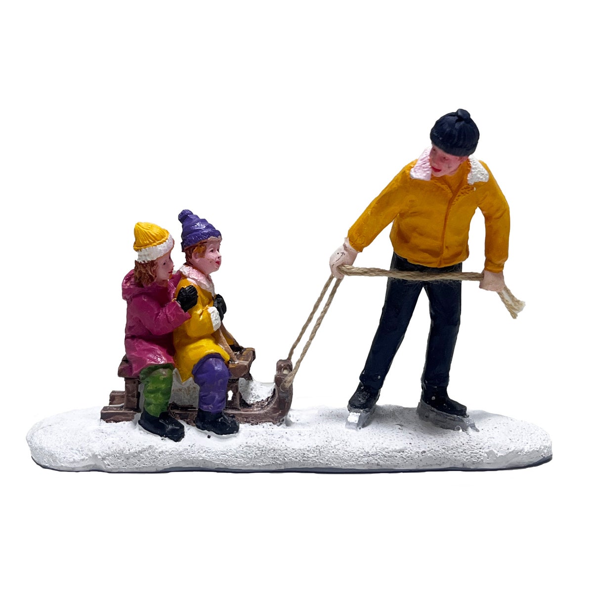 Kerstdorp vader met kinderen op slee Kerstdorp vader met kinderen op slee
