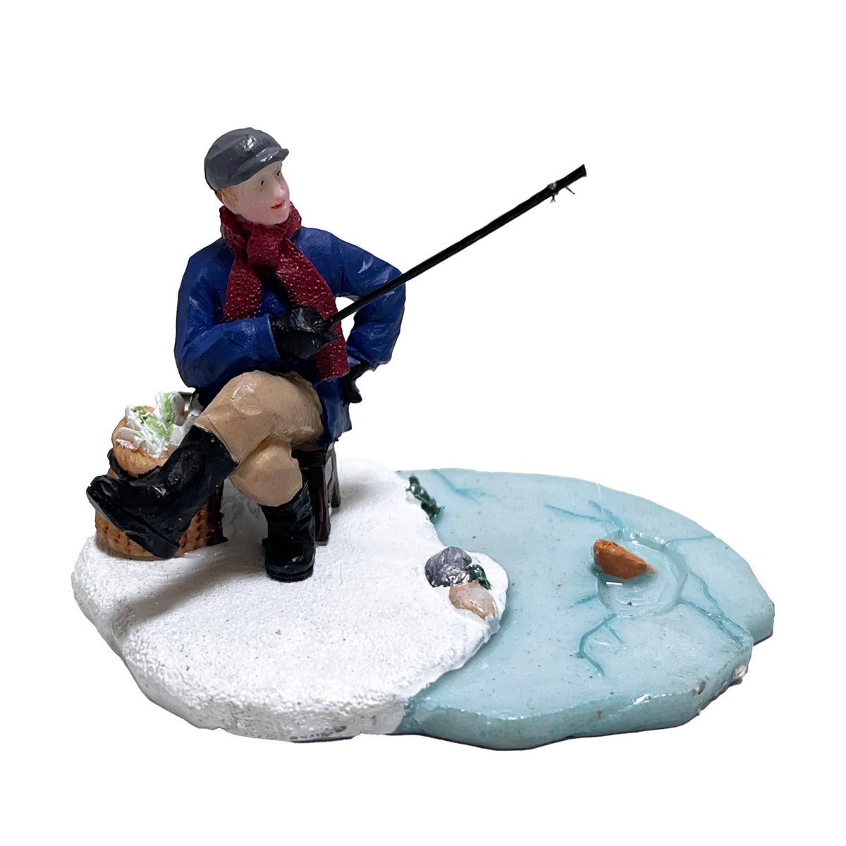 Kerstdorp visser zittend Kerstdorp visser zittend